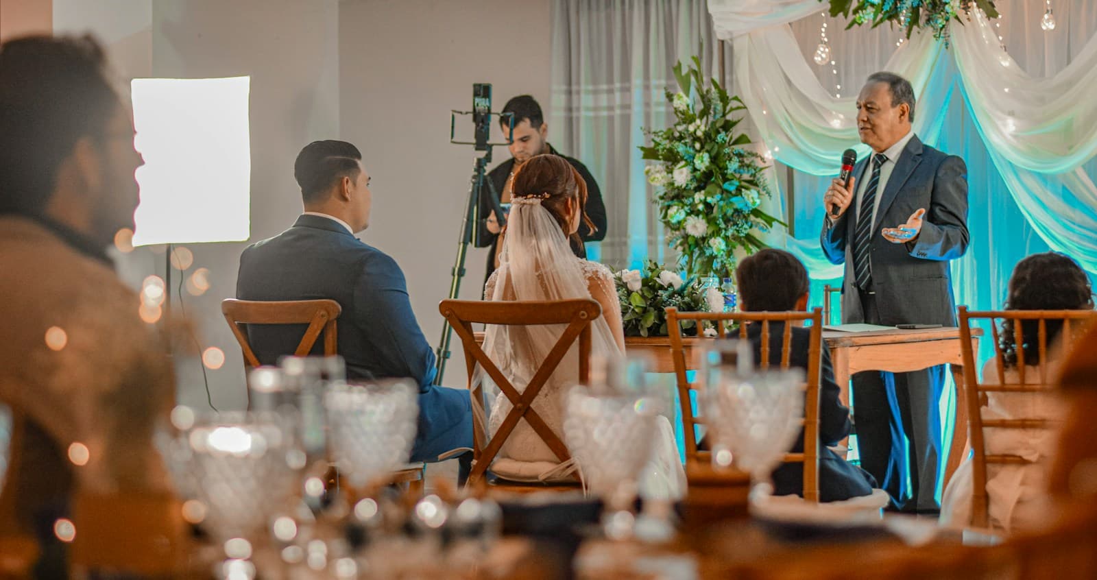 A guest giving a wedding reception toast